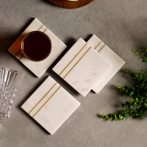 White Marble Coasters with Brass Inlay – Set of 4